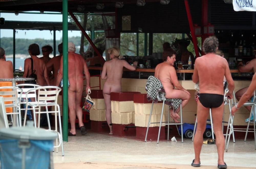 Outdoor diner view - nudism in the world