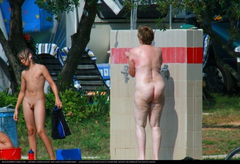 Covered in Towel Nudists-Boardwalk Biking - nudism in the world